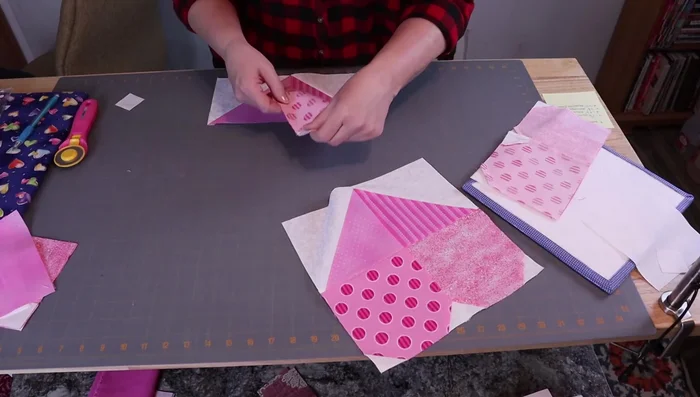 Join the top and bottom heart pieces together. Press seams in alternating directions.