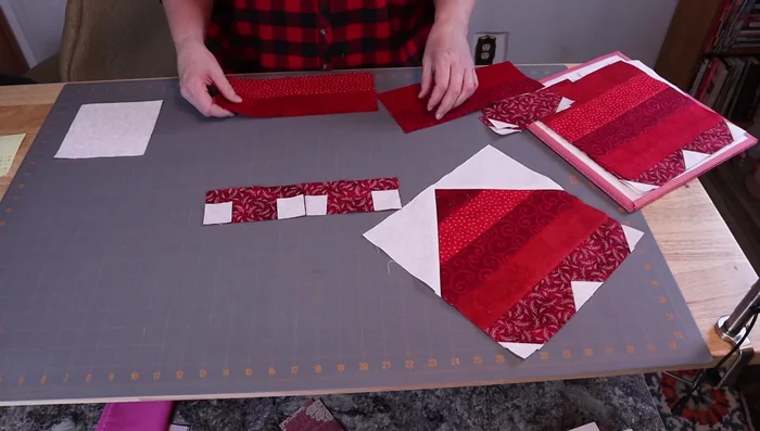 Sew the two pairs of strips together. Press seams to one side.