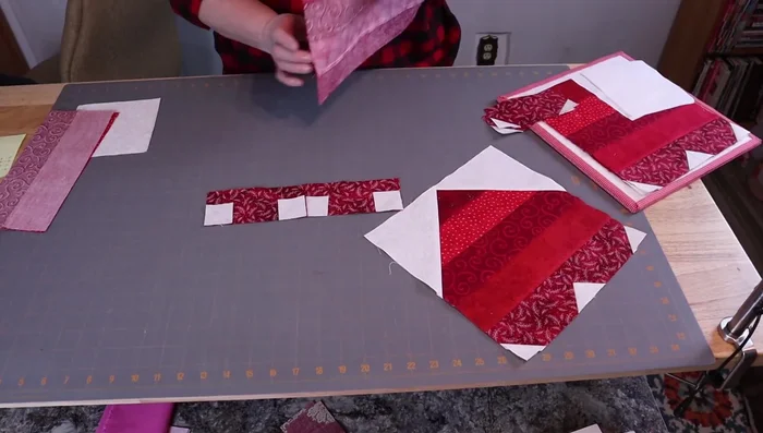 Sew the two pairs of strips together. Press seams to one side.