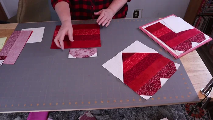 Attach the strip pieced section to the four-patch section. 