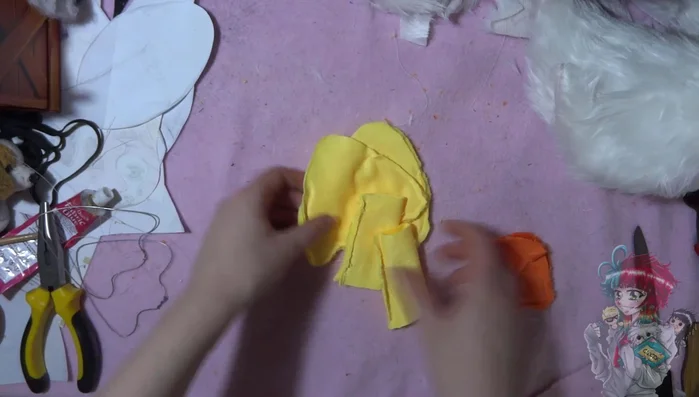 Attach the features. Carefully attach the beak, legs, and feet.