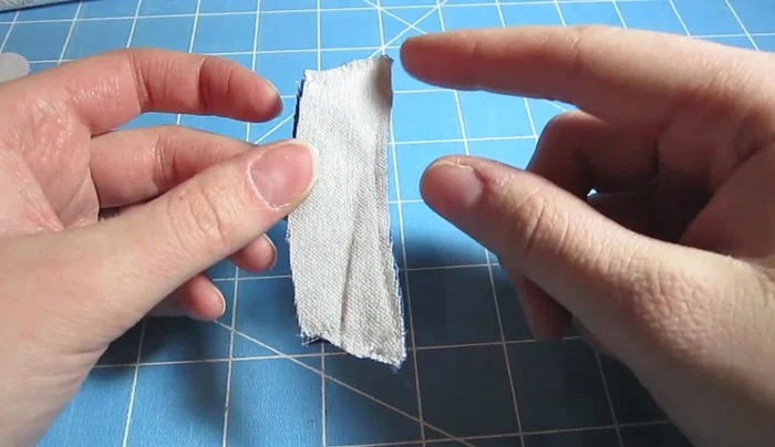 Turn the fins right side out, using a point turner or needle and thread to push out the corners. Iron to flatten.