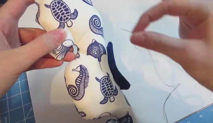 Add eyes (optional): Embroider eyes using a needle and thread in your desired shape or attach buttons.