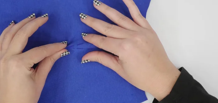 Sew the dart using a regular straight stitch, starting at the widest point and sewing towards the point. Secure the end by hand-tying a knot instead of backstitching.