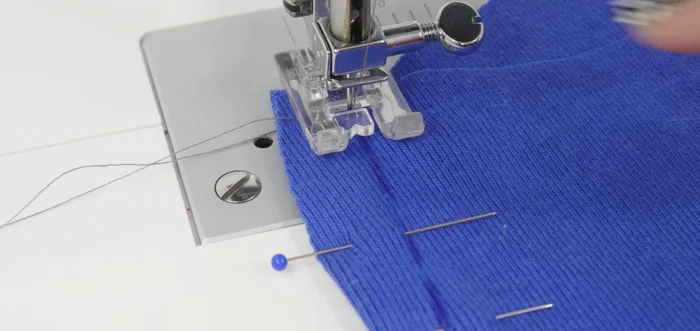 Sew the dart using a regular straight stitch, starting at the widest point and sewing towards the point. Secure the end by hand-tying a knot instead of backstitching.