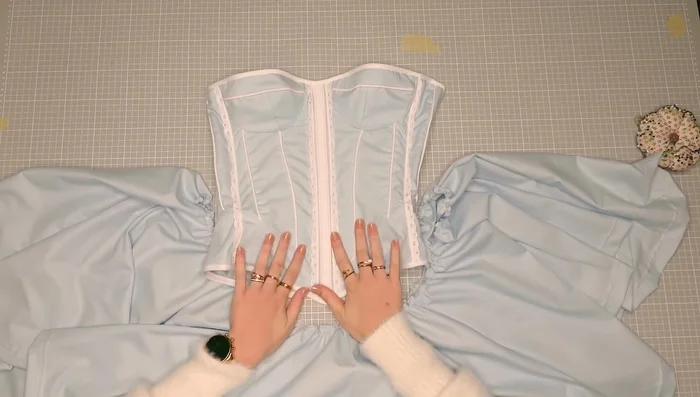 Sew zipper into the skirt.