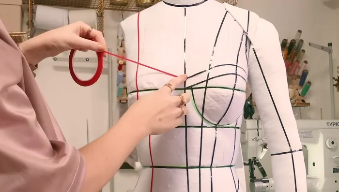 Add design lines as needed. Create a hemline, potentially adding a hip piece for comfort.