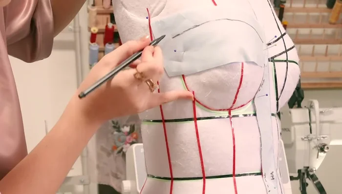 Cut pattern pieces from fashion fabric and interlining.