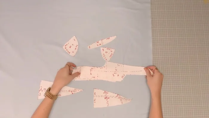 Cut pattern pieces from fashion fabric and interlining.