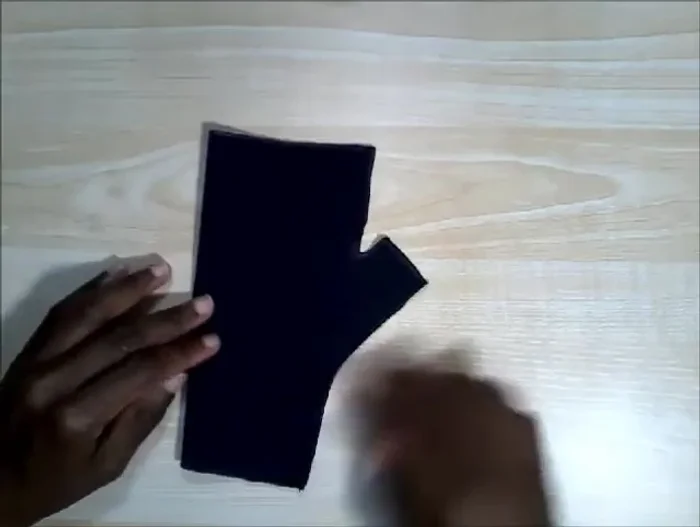 Hem the gloves: Hand-stitch the hems using backstitch, stretching the opening wide while stitching and keeping stitches loose to maintain stretch.