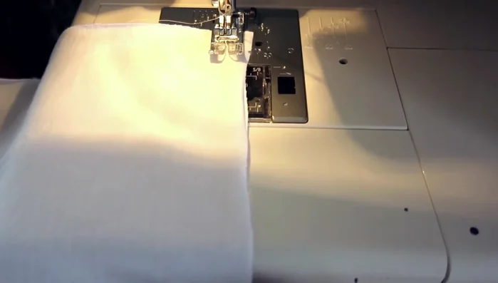 If using trim, sandwich it between the fabric layers before sewing.