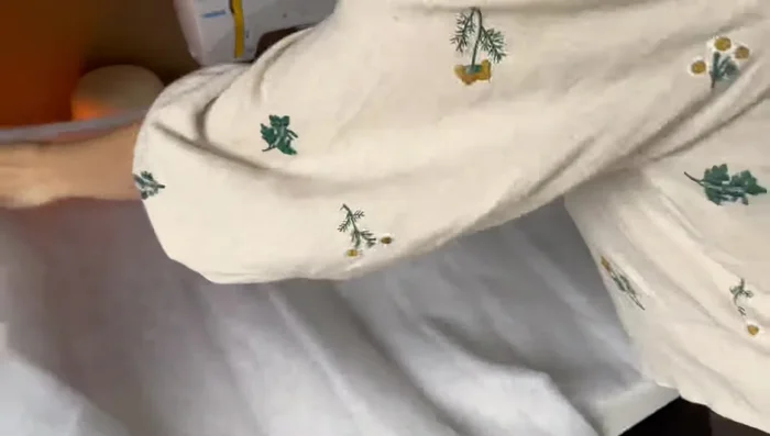 Cut out the fluffy quilting material slightly larger than the fabric squares to allow for mistakes and sliding during quilting.