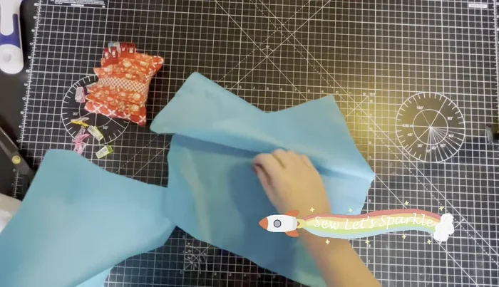 Sew Lining Fabric: Sew the lining pieces right sides together, leaving a 4-inch gap at the bottom for turning. Use clips, not pins, if using waterproof fabric.