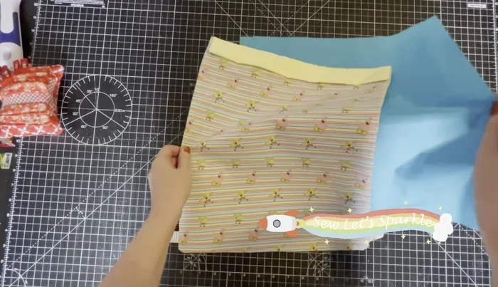 Insert Outer into Lining: Turn the outer bag right side out and the lining inside out. Insert the outer bag into the lining, aligning seams and clipping together. Nest the seams.