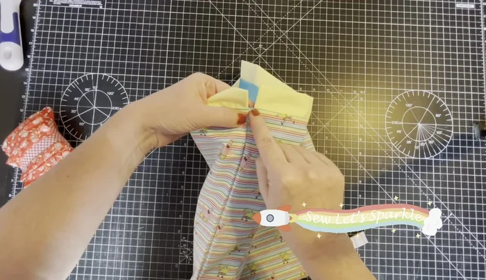 Topstitch: Top stitch all the way around the outer edge of the bag to secure the lining and outer fabrics together. 