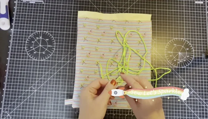 Insert Drawstrings: Use a safety pin or bodkin to thread the drawstrings through the drawstring channels. Knot the ends securely, or leave them loose for adjustable length.