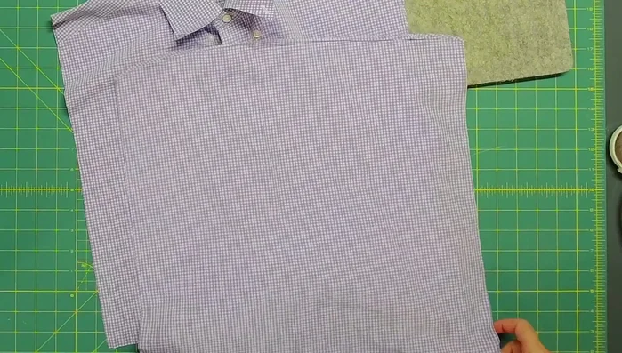 Pin or clip the flap in place, then stitch it to the envelope backing.