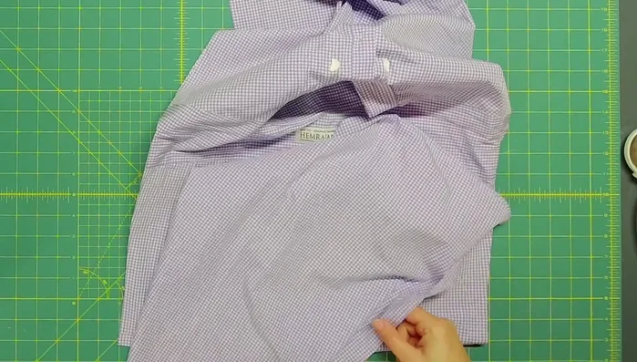 Pin or clip the flap in place, then stitch it to the envelope backing.