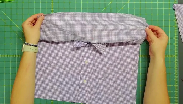 Assemble the pillow: Place the front and back pieces right sides together, aligning the edges. Pin or clip, ensuring the inner flap is even with the front. Stitch around three sides with a quarter-inch seam allowance, and then a half-inch seam allowance to secure raw edges.
