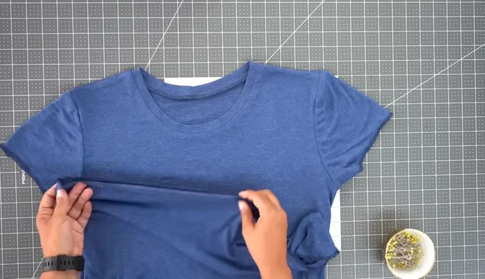 Hem the sleeves and body: Hem the sleeves and body of the t-shirt using a narrow zig-zag stitch.