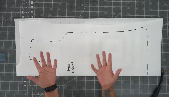 Add seam allowance: Add seam allowance (at least 1 inch for the hem, 5/8 inch for sides and armscye, 1/2 inch for the neck) to your traced pattern pieces.