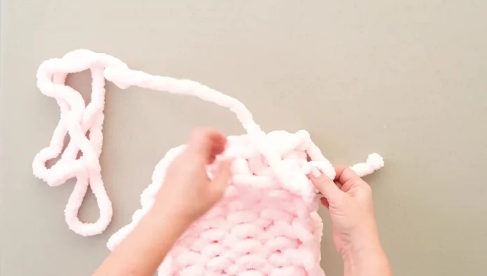 Repeat this process along the edge to sew the two sides together.