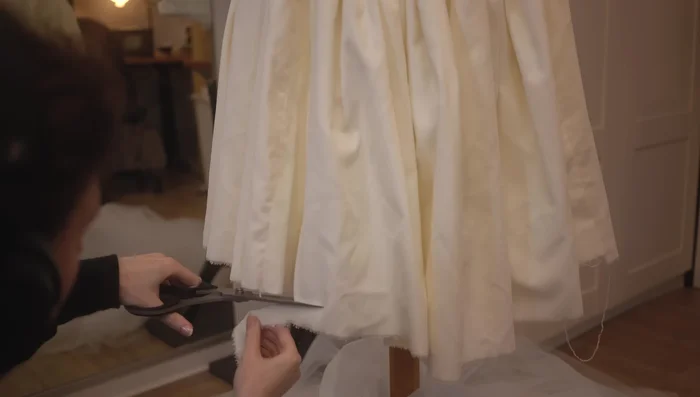 Shorten and attach the petticoat to provide extra support and puffiness.