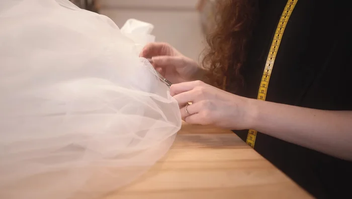 Shorten and attach the petticoat to provide extra support and puffiness.