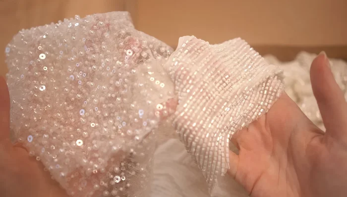 Add beading to the bodice and skirt