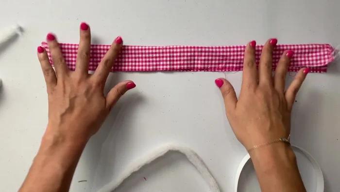 Trim excess batting flush with the headband edges.