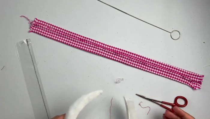 Trim excess batting flush with the headband edges.