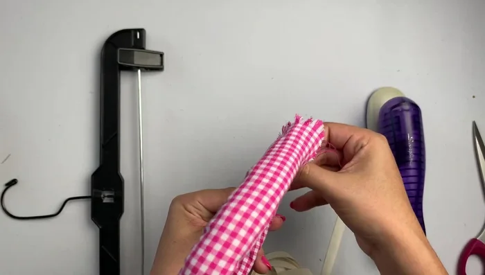 Remove clips and trim excess twill tape.