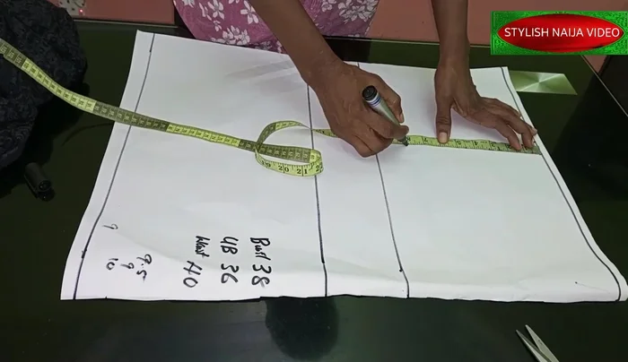Mark the underbust line (36 inches, divided by 4 = 9 inches + 2 inches seam allowance).