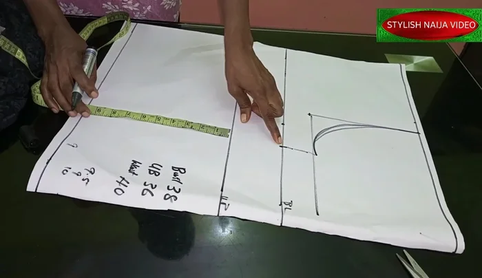 Mark the underbust line (36 inches, divided by 4 = 9 inches + 2 inches seam allowance).