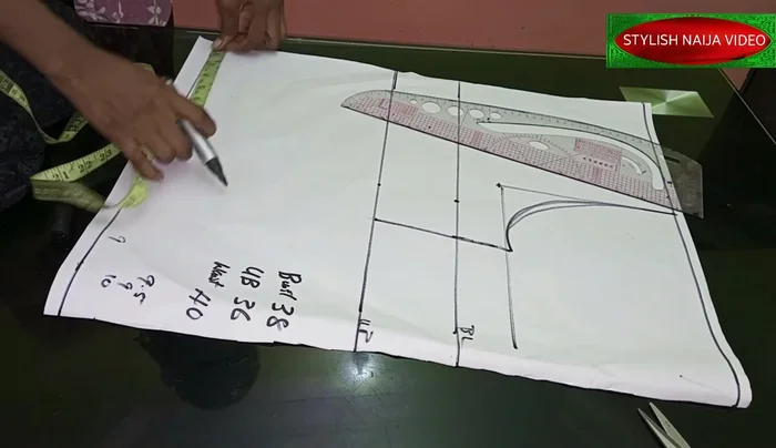 Cut out the neckline (2.5 inches wide for the front and back; 1 inch depth for the back, 2.5 inches for the front). Create a shoulder slope of 0.5 inch.