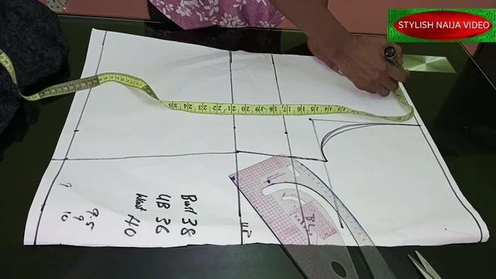 Cut out the neckline (2.5 inches wide for the front and back; 1 inch depth for the back, 2.5 inches for the front). Create a shoulder slope of 0.5 inch.
