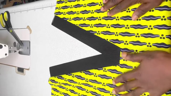 Cut out the neckline pattern. You should have a 1-inch opening at the center.