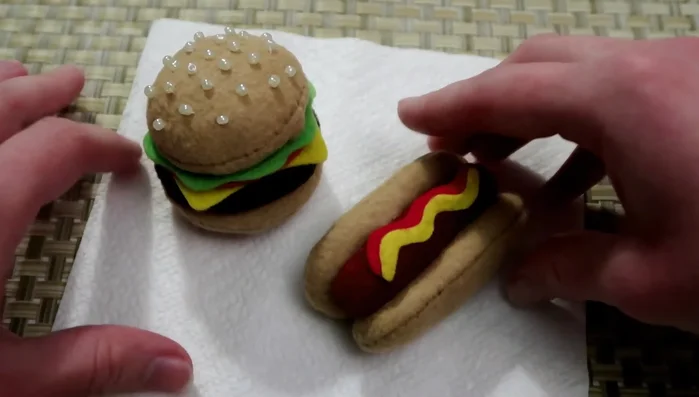 Optional: Embellish the hot dog with additional details, such as relish or chili.