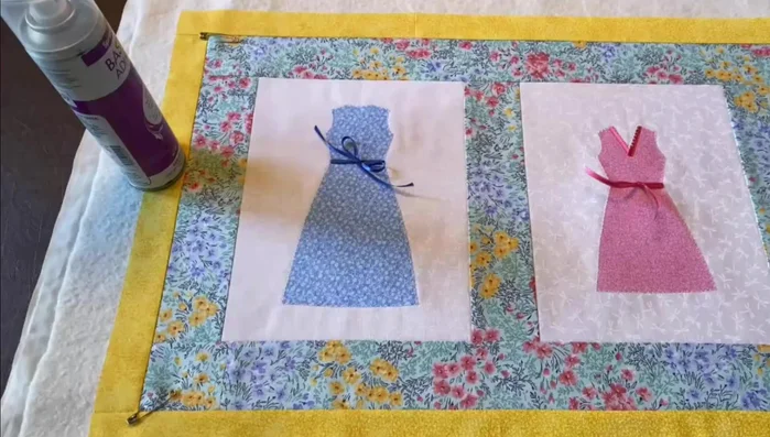 Baste Quilt Layers: Baste the quilt top, batting, and backing fabric together using spray adhesive and safety pins.