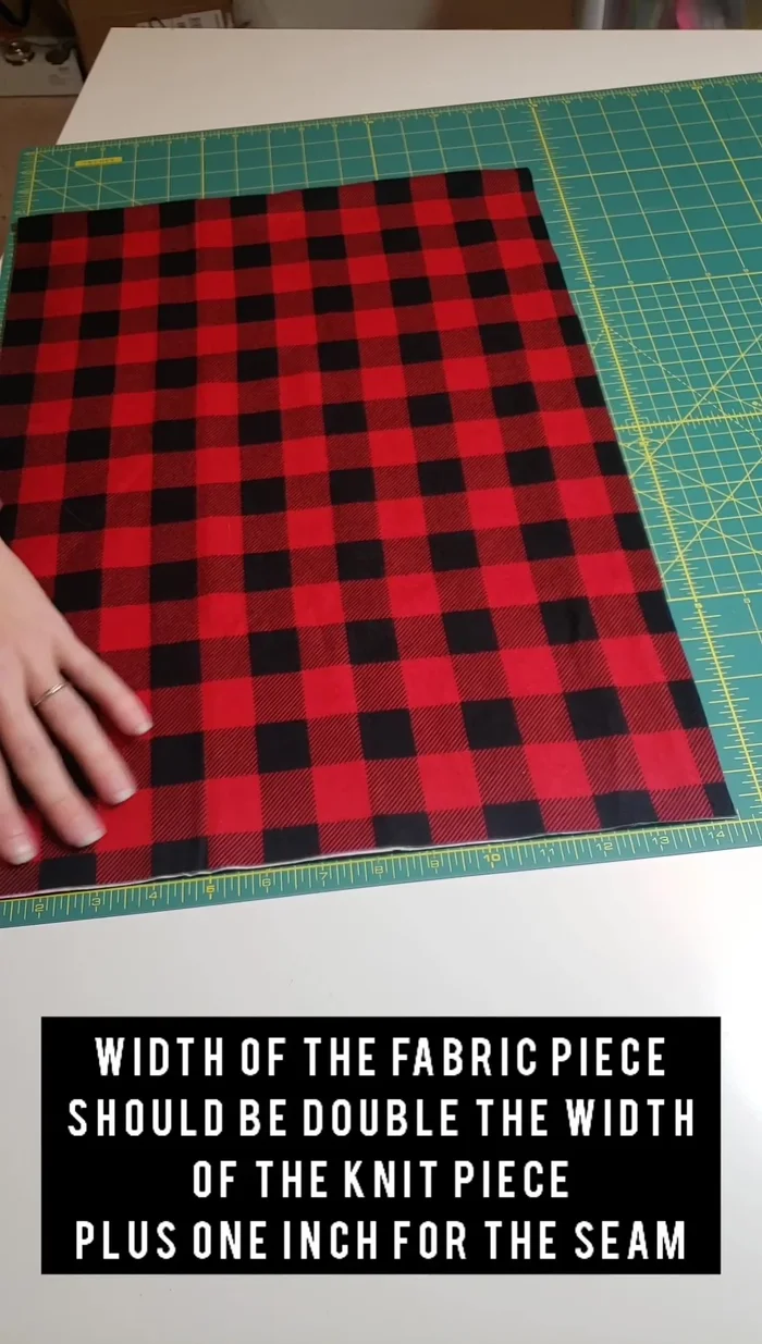 Fold the flannel fabric in half lengthwise (hot dog style), matching the raw edges. Pin to hold.