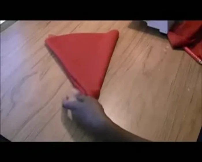 Cut the waistline: Cut a hole in the center of the circle to create the waistline of your skirt. There's no perfect size; adjust according to your desired waist.