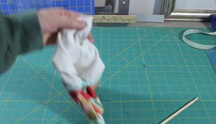 Trim the corners: Snip the corners of the seam allowance to reduce bulk.