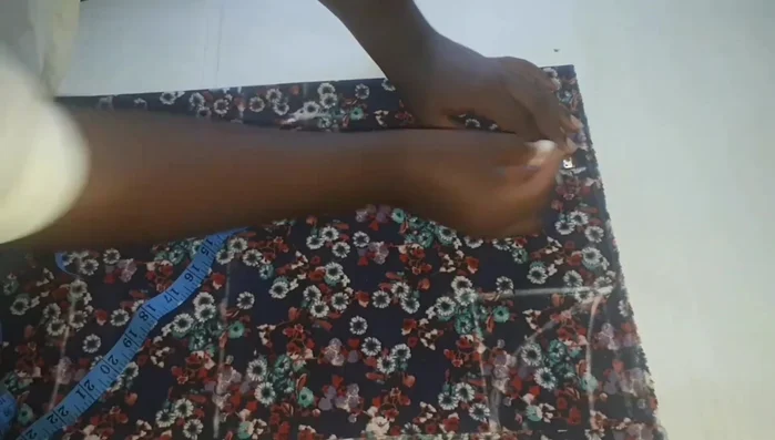 Shape armhole curve.