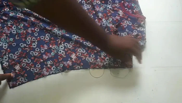 Hem the bottom of the top.