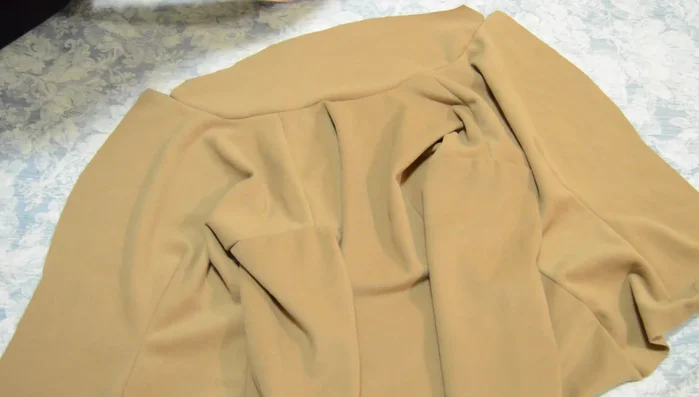 Trim excess fabric from the facing.