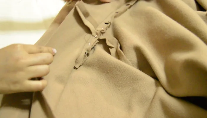 (Optional) Attach shoulder pads to shoulder seam allowances.