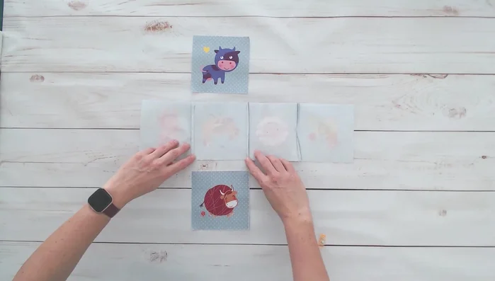 Sew the top and bottom pieces to the central row, aligning seam allowances.