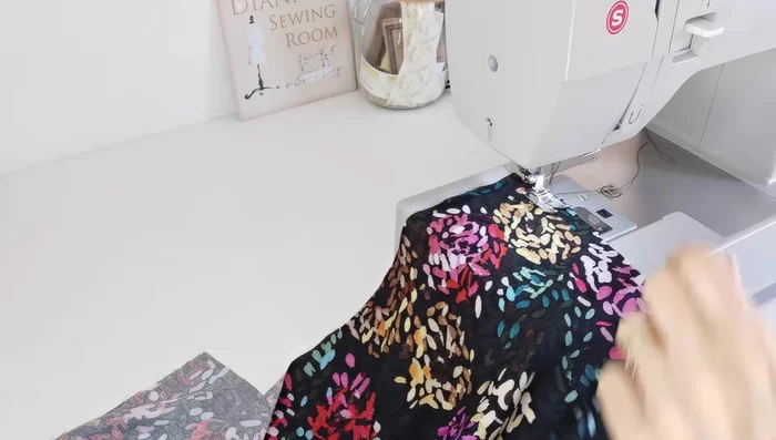 Gather Sleeves: Sew two lines of gathering stitches along the top of each sleeve between markings.