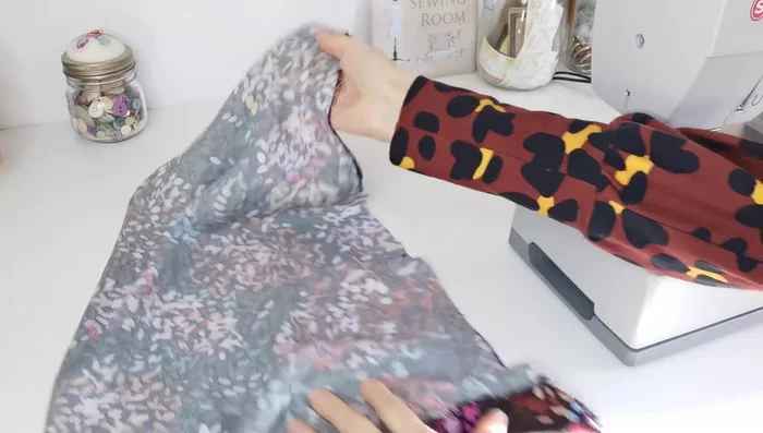 Sew Sleeves: Sew down the sleeve from the cuff to the small square mark, backstitching at the mark. Repeat for both sleeves.