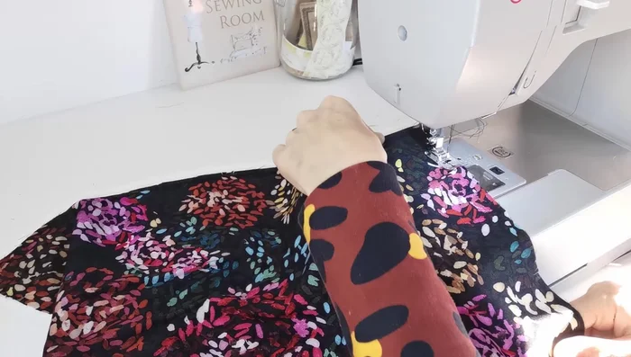 Gather Bottom Panels: Sew two lines of gathering stitches along the top of the bottom front and back panels.